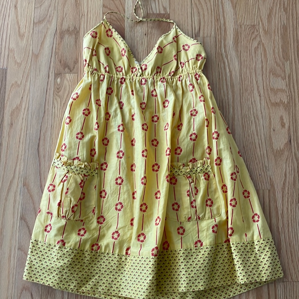 Forever 21 sundress with front pockets and ties around the neck size small.  G